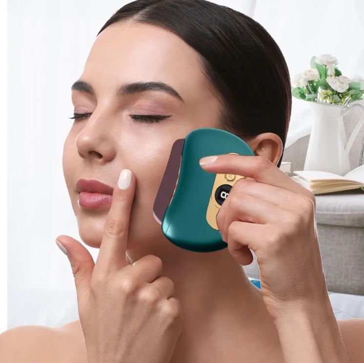 GlowStone™:Masajeador Facial con Calor, Vibración y Luz Roja